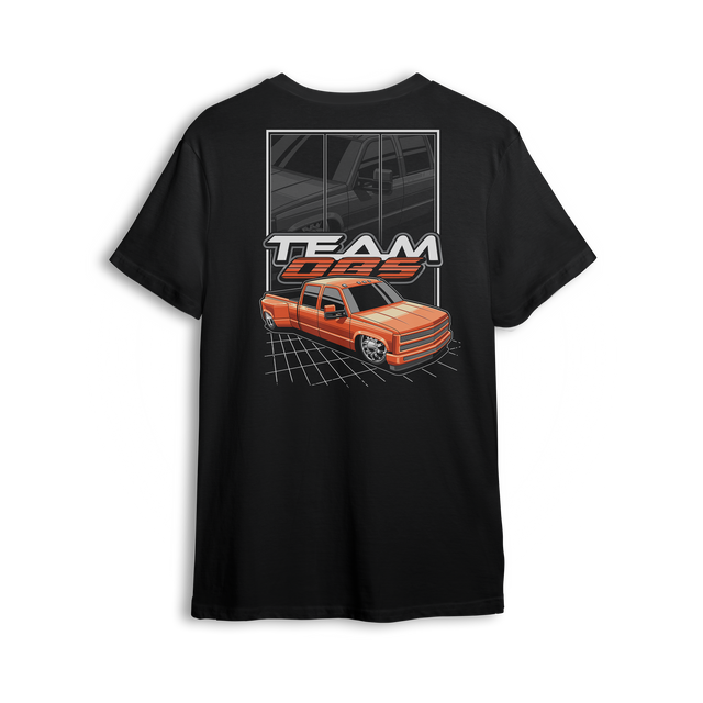 T-shirt featuring a bright orange OBS extended cab truck on digital grid background with grayscale reflection and Team OBS text.