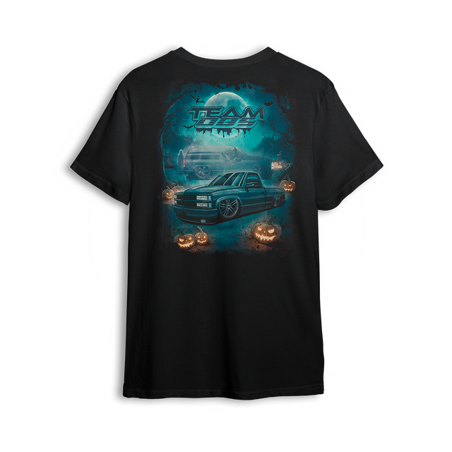 Team OBS Halloween tee with slammed single cab and ghost SUV art in a spooky cemetery scene with pumpkins and moonlight