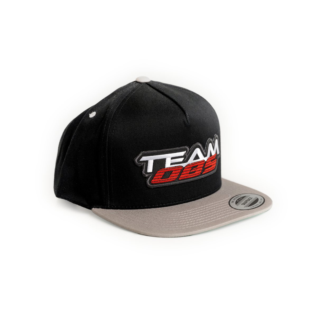 The Classic OG Flat Bill Snapback with black crown, gray bill, and 3D Team OBS logo in red, white, and black
