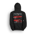 Hoodie with two red OBS trucks, city skyline, palm trees, and low stance. Design captures the sunset cruise truck scene.