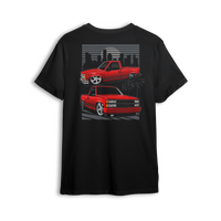 T-shirt with two red OBS trucks, city skyline, palm trees, and low stance. Design captures the sunset cruise truck scene.