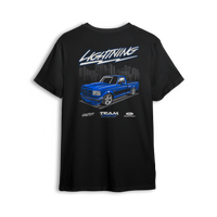 T-shirt featuring a slammed blue Ford Lightning truck over a city skyline with stylized Lightning script and lowered stance.