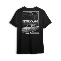 Tuck N Roll t-shirt featuring white OBS truck with tucked wheels and custom stance. A clean nod to the real drop scene.