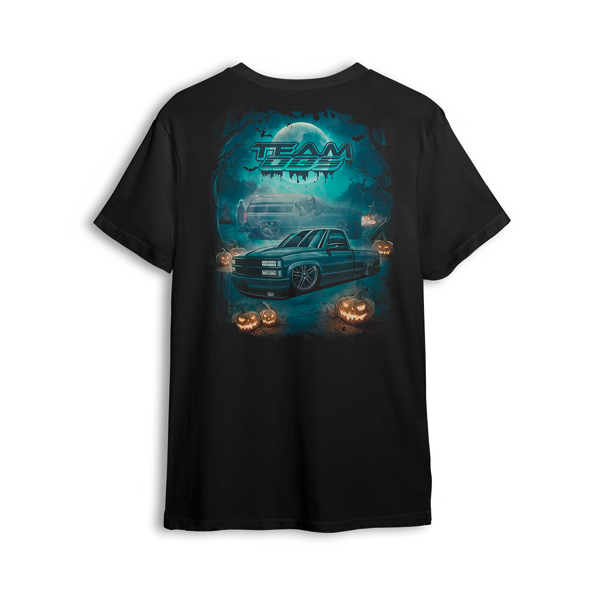 Team OBS Halloween tee with slammed single cab and ghost SUV art in a spooky cemetery scene with pumpkins and moonlight